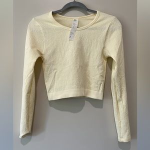 women’s cream color crop long sleeve work out. size medium